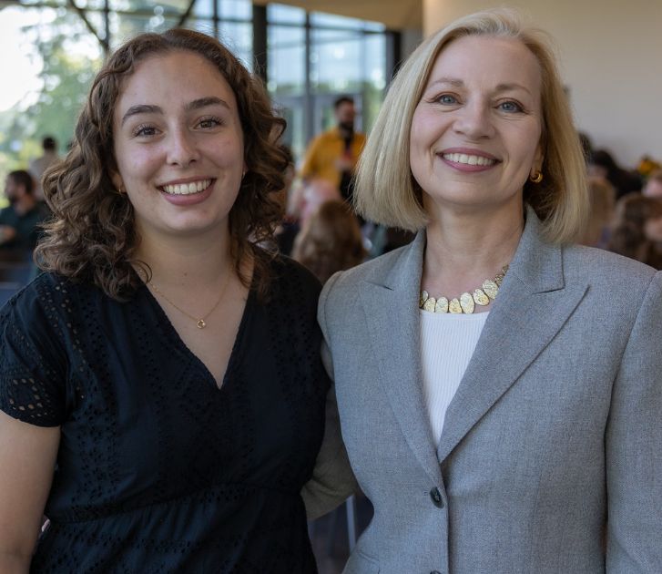 Two women smiling for the picture