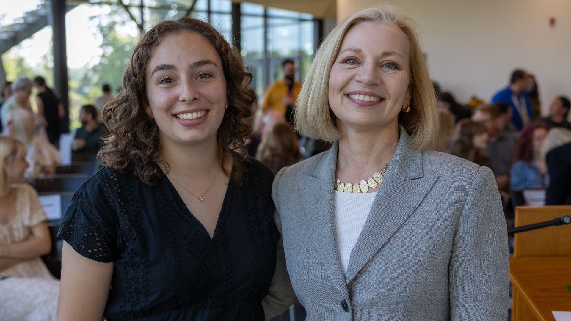 Two women smiling for the picture