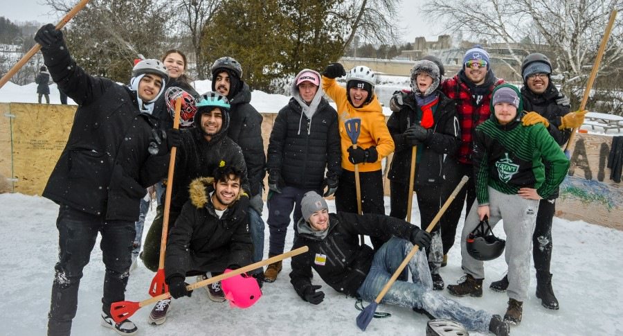 Image of students playing Hockey outside Champlain College